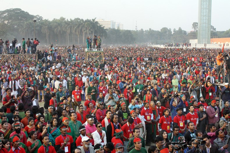 Thousands of people sing the anthem on the Victory Day in Dhaka