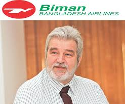 kevin-with-biman-writing-in-back-wall