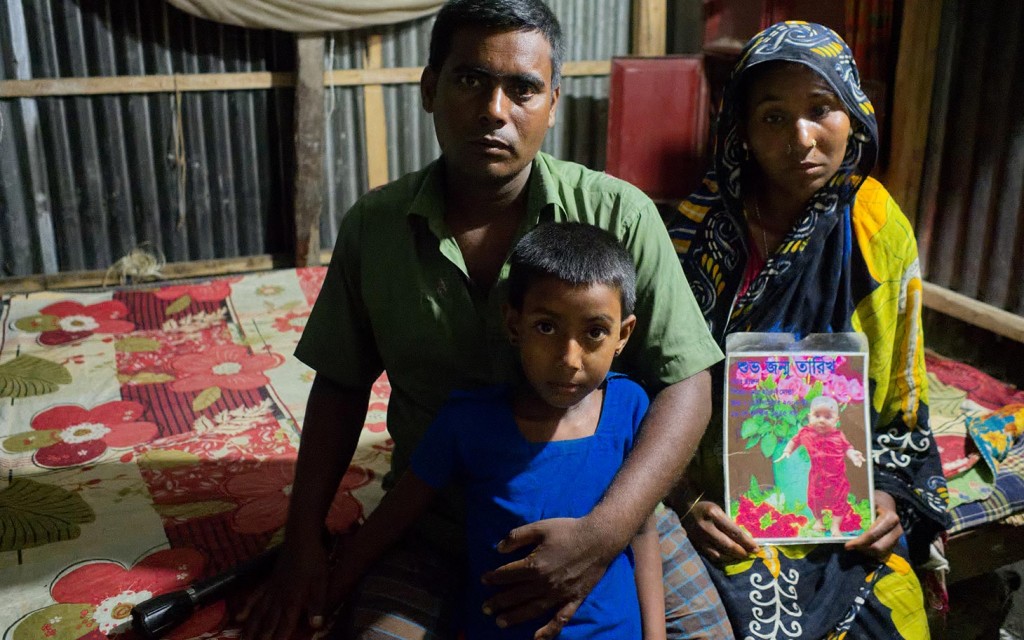 Abdul Hannan, the father of 6 year old Harun, who was kidnapped and killed, with his family in tebaria Bangladesh. Lazar Simeonov