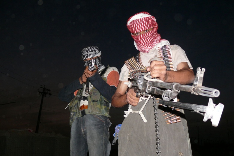 1280px-Iraqi_insurgents_with_guns_1