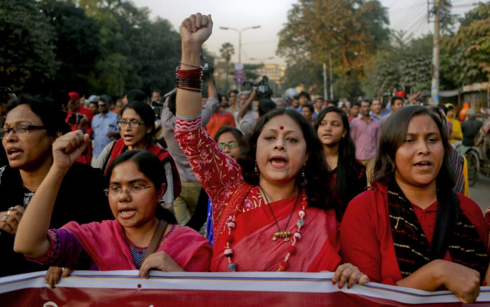 Bangladeshi activists who have been campaigning for capital punishment for war criminals march in a rally, as they celebrate the execution of two opposition leaders in Dhaka, Bangladesh, Sunday, Nov. 22, 2015. Bangladesh executed two opposition leaders Sunday for war crimes during the country's 1971 independence war, despite concerns that the legal proceedings against them were flawed and threats of violence by their supporters.(AP Photo)