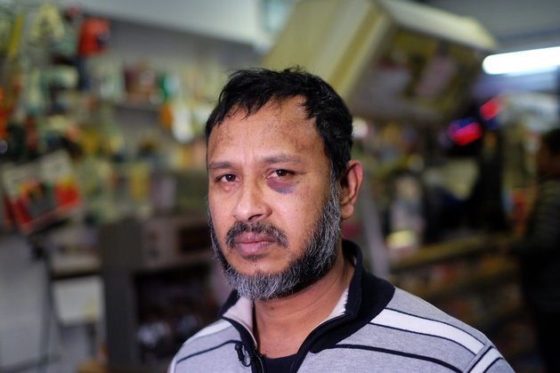 Muslim shopkeeper Sarkar Haq, who was beaten in an alleged hate crime, speaks during an interview at his shop in New York on December 7, 2015. Muslim American leaders accused Republican Presidential hopeful Donald Trump of incitement for demanding a "complete shutdown" of Muslims entering the US after a New York shopkeeper was beaten in an alleged hate crime. Trump's stunning statement followed last week's mass shooting in California by a Muslim couple believed to have been radicalized by extremists, and landed with a thunderclap just as fellow presidential candidates were contemplating ways to improve national security. AFP PHOTO/JEWEL SAMAD / AFP / JEWEL SAMAD        (Photo credit should read JEWEL SAMAD/AFP/Getty Images)